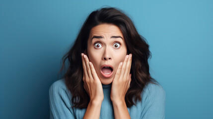 Woman with wow face holding hands near cheeks. Sale or discount advertising poster with surprised female. Blue background - obrazy, fototapety, plakaty