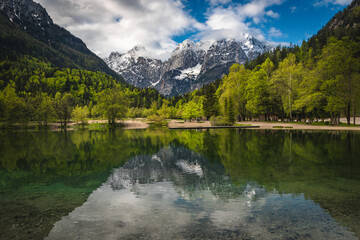 Amazing mountain lake and snowy peaks in Slovenia