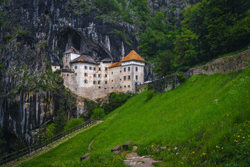 Magical Predjama Cave Castle on the cliffs in Slovenia