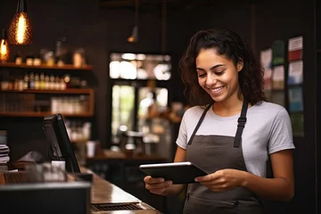Fotobehang Happy woman, tablet and portrait of barista at cafe for order, inventory or checking stock in management. Female person, waitress or employee on technology small business at coffee shop restaurant © Kowit