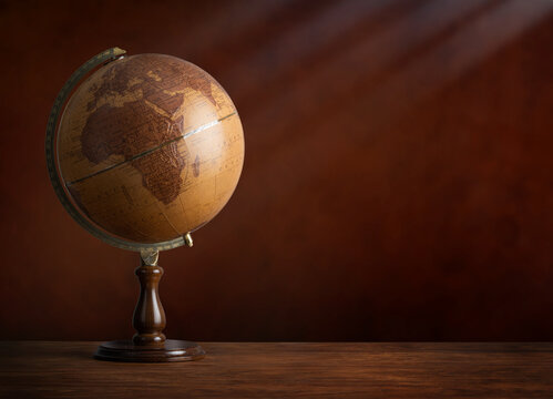 Old geographic globe. Science, education, travel, vintage background. History and geography team.