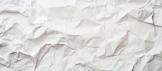 Fototapeta premium Zoom in on a background filled with crumpled paper creating a texture and leaving space for copying