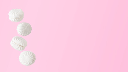Soaring white zephyr marshmallow on pink background, food levitation banner