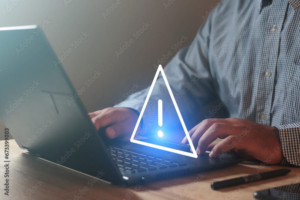 Wall mural businessman using laptop computer for helps avoid manual errors in businees