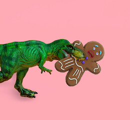 Big green dinosaur eats ginger man. Funny Christmas card.