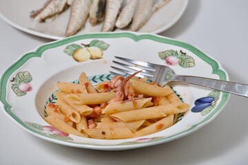pasta with squid in tomato sauce
