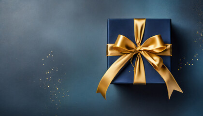 Dark blue gift box with gold satin ribbon