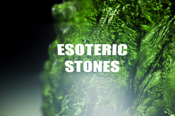 Esoteric stones text background. Green healing crystal. Glow. Alternative therapy concept wallpaper.