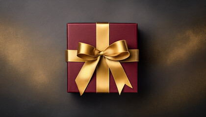 Dark red gift box with gold satin ribbon