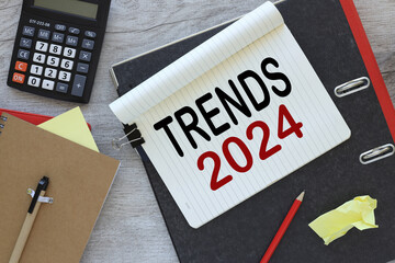 trends 2024 text on notepad page. view from above