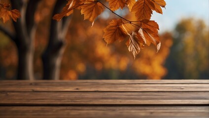photo of an empty wooden table with a blurred autumn background

