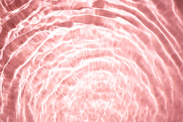 Beautiful water texture with waves. pink color, water background