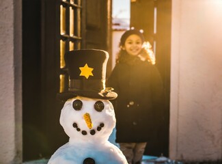 Snowman on house entrance, Christmas Seasonal Concept