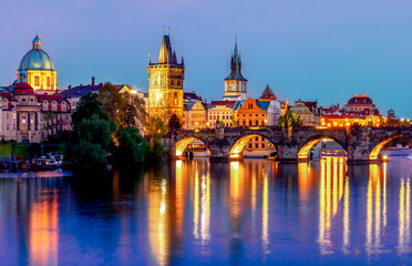 Fototapeta na wymiar Prague cityscape with Charles bridge over Vltava river at night, Czech Republic