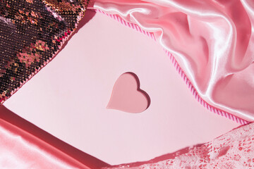 Heart symbol, creative pink background, month of love celebration.