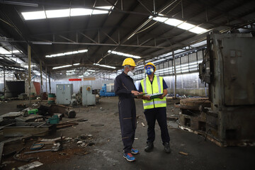 chemical dangerous zone ,  scientist in a protective suit works in a biological contamination zone.