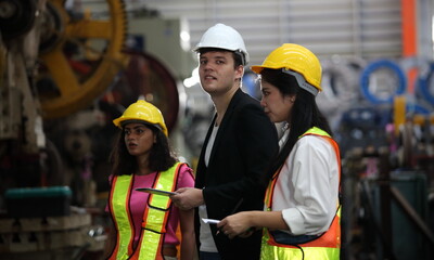 engineer team or worker team  with safety uniform standing at industry.