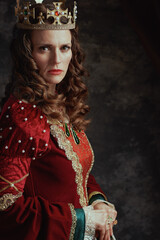 medieval queen in red dress with crown