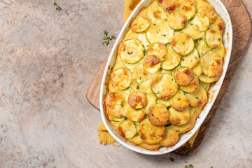 casserole with cheese and zucchini in baking dish