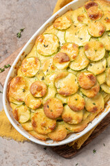 casserole with cheese and zucchini in baking dish