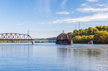 Dubuque Railroad bridge opens to allow river cruise boat to pass on Upper Mississippi in Dubuque...