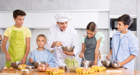 Pleasant and sociable young man, professional chef, leading culinary courses, imparting cooking...