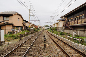 Fototapeta na wymiar Train tracks running through Kyoto, Japan.