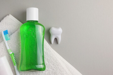 A mouthwash on a colored background. Dental care, dental health.