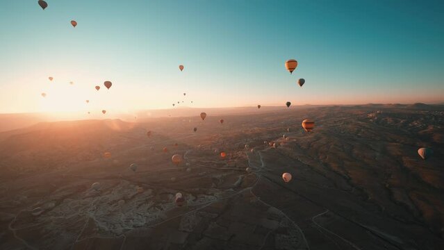 Hot air balloons flight the early morning. Cappadocia is one of the most well known tourist destination. You can visit the fairy chimneys and ride a hot air balloon during the sunrise.