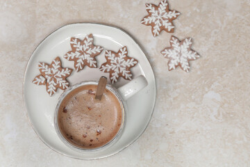 Christmas gingerbread cookies and chocolate milk mug, concept of winter holidays desserts and decoration