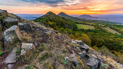 Sunset among the volcanic hills of the Bohemian Highlands, photographed from Brník hill, other...