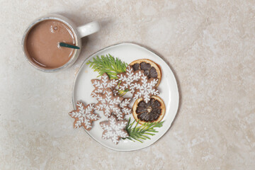 Christmas gingerbread cookies and chocolate milk mug, concept of winter holidays desserts and decoration