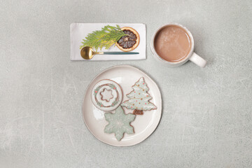Christmas gingerbread cookies and chocolate milk mug, concept of winter holidays desserts and decoration