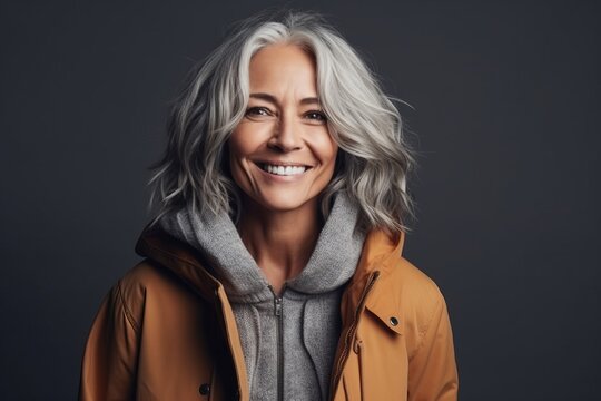 Portrait of a beautiful middle-aged woman smiling at the camera