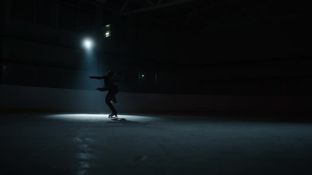 Figure Skating Sport, Talented Junior Figure Skater Girl Training On Ice Rink In Darkness, Champion