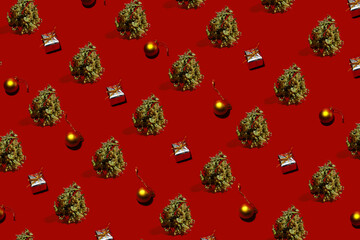 Cannabis buds, gifts and Christmas tree decorations on a red background. Pattern - 673523887