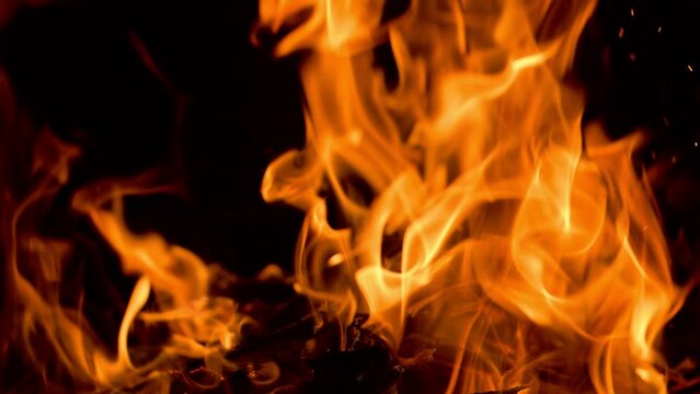 Fire flames in fireplace. 4K Slow motion video.