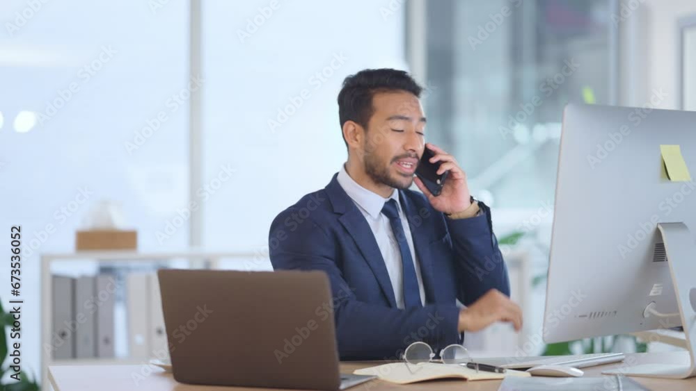 Poster Happy business man talking on his phone while working on a computer and smiling alone at work. Young corporate professional having a discussion and explaining project details to a colleague or client