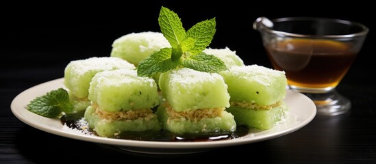 Onde onde also known as jian dui is a well liked Indonesian cake It is a traditional Indonesian dish often served on a pristine white plate