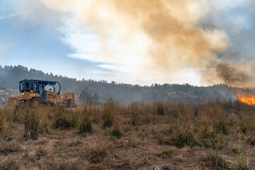 Bulldozer Fighting Wildfire © kcapaldo
