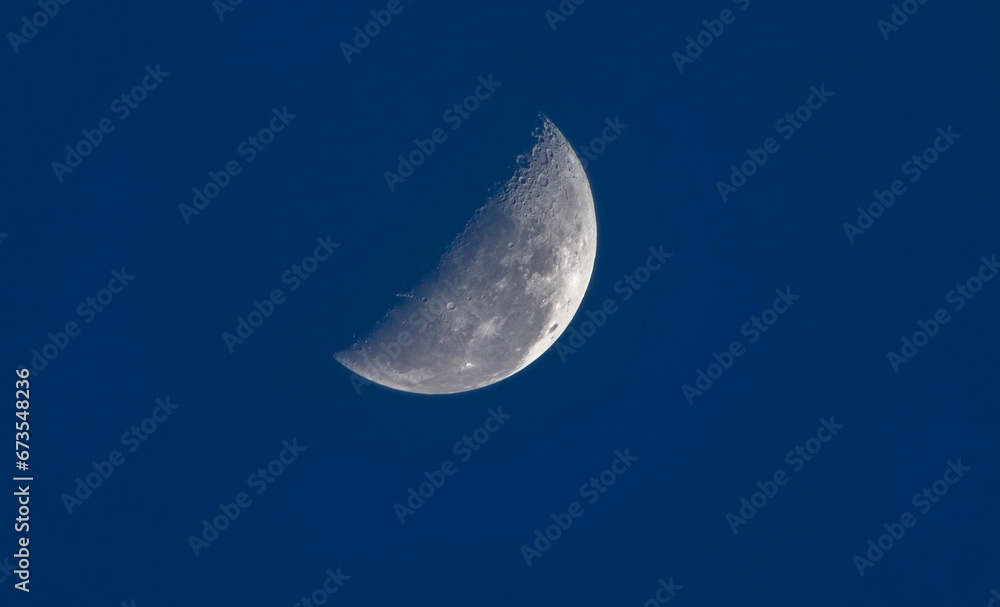 Wall mural moon closeup showing the details of lunar surface. horizontal image