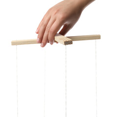 Woman pulling strings of puppet on white background, closeup