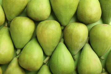 Many fresh green figs on table, top view
