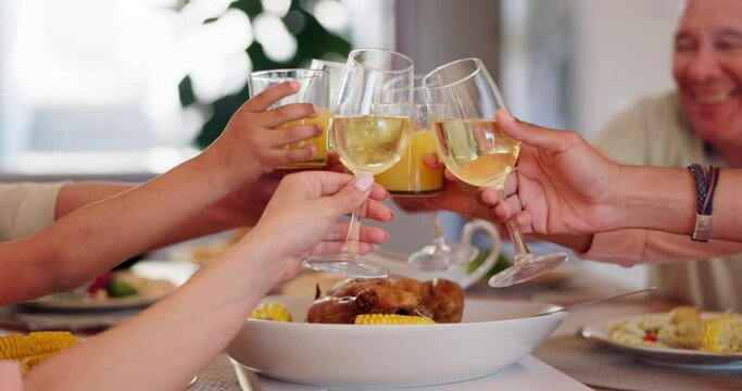Happy family, hands and cheers for dinner celebration together with meal or support at home. Group, wine glass closeup or people by table for food, drink or bond at brunch with smile, care or toast