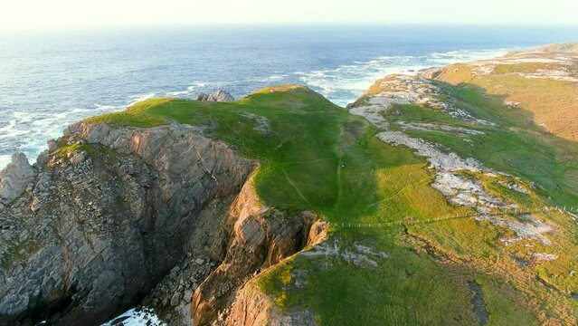 Camping tent on the cliff at Scheildren, most iconic and photographed landscape at Malin Head, Wild Atlantic Way, spectacular coastal route. Wonders of nature. Numerous Discovery Points. Co. Donegal