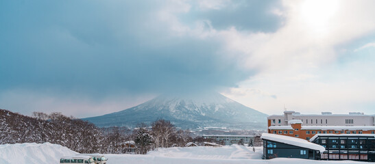 Beautiful Yotei Mountain with Snow in winter season at Niseko. landmark and popular for Ski and Snowboarding tourists attractions in Hokkaido, Japan. Travel and Vacation concept