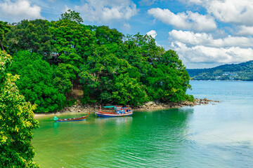 Patong Beach Phuket Thailand nice white sandy beach blue Skies with some clouds and turquoise...