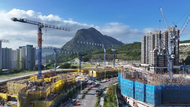 Aerial drone skyview of Hillside Rock Cavern Quarry Development in Anderson Road ,land formation construction housing project in Kwun Tong Sau Mau Ping Tseung Kwan O Kowloon Hong Kong China