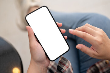 Top view image of a white-screen smartphone mockup in a woman's hand.