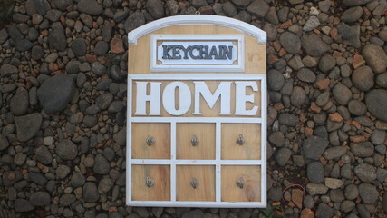 Fototapeta premium clothes hangers, antique and unique clothes. made of wood with a rustic bohemian theme